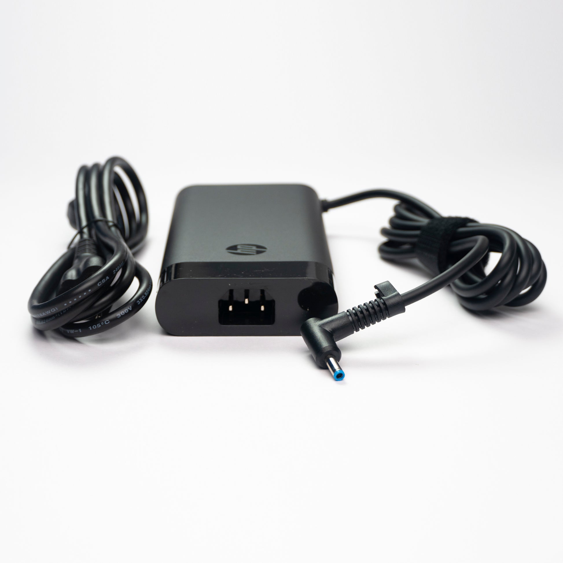 Adaptador de corriente HP de 230W con protecciones eléctricas industriales en caja